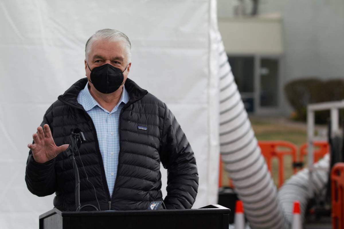 Gov. Steve Sisolak speaks in front of a mobile vaccine unit that was brought into the state by ...