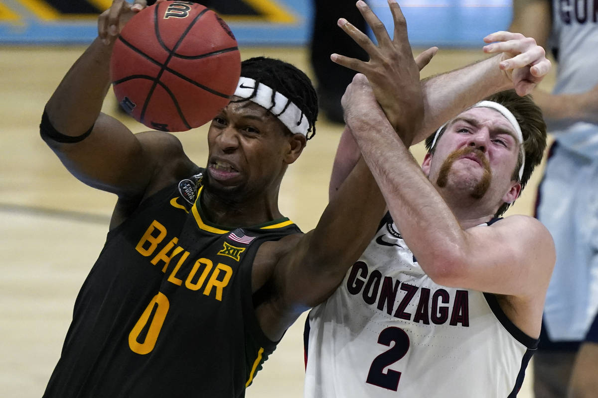 Baylor forward Flo Thamba (0) fights for a rebound with Gonzaga forward Drew Timme (2) during t ...