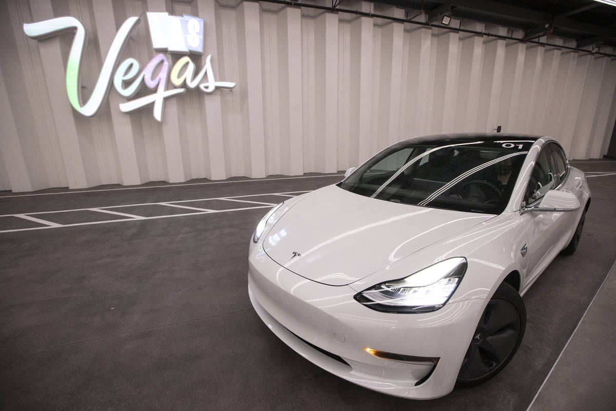A Tesla electric car at Central Station of the Boring Company’s Convention Center Loop i ...