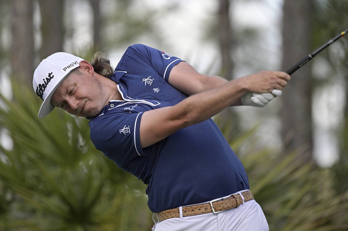 Cameron Smith, of Australia, hits his tee shot on the second hole during the third round of the ...