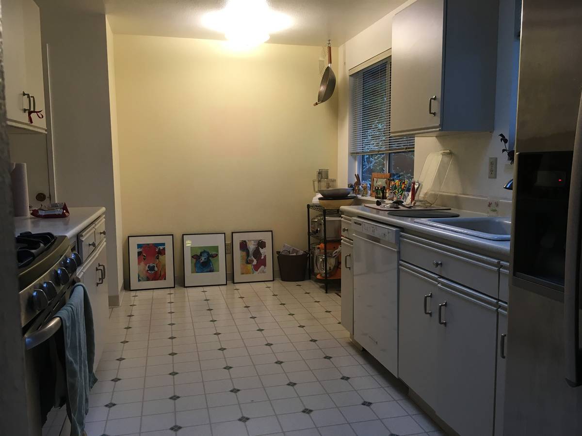 Seriously Happy Homes Before: The kitchen was contained to one side of the room, limiting the a ...