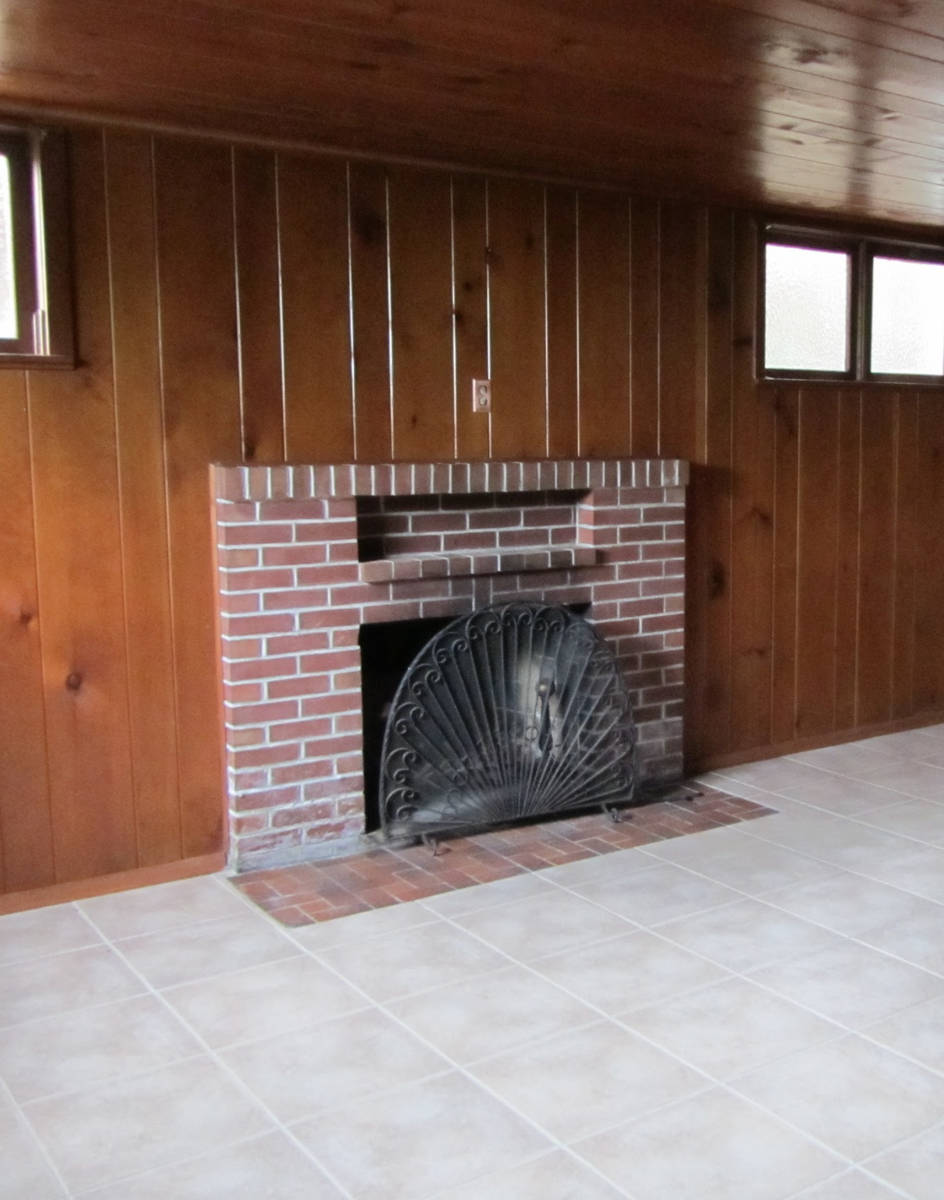 Seriously Happy Homes Before: This classic wood-paneled recreation room and its boring brick fi ...
