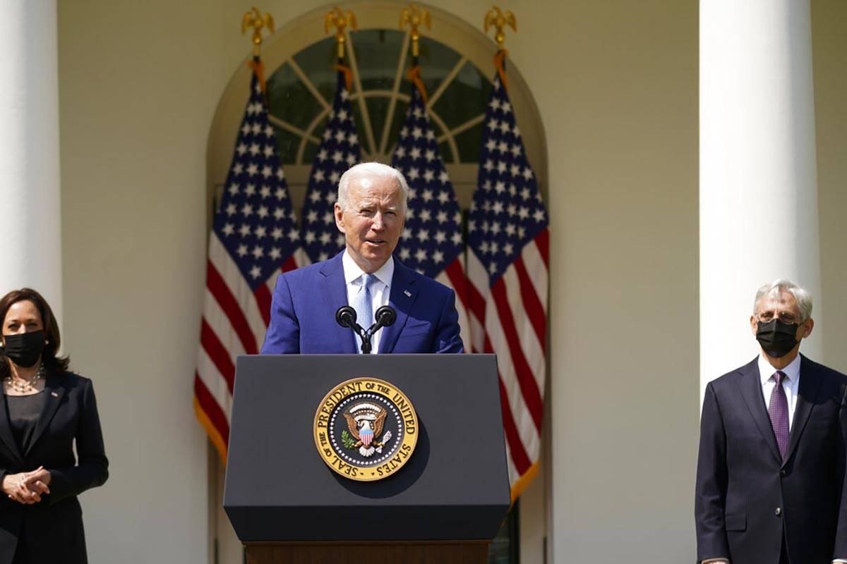 President Joe Biden, accompanied by Vice President Kamala Harris, and Attorney General Merrick ...