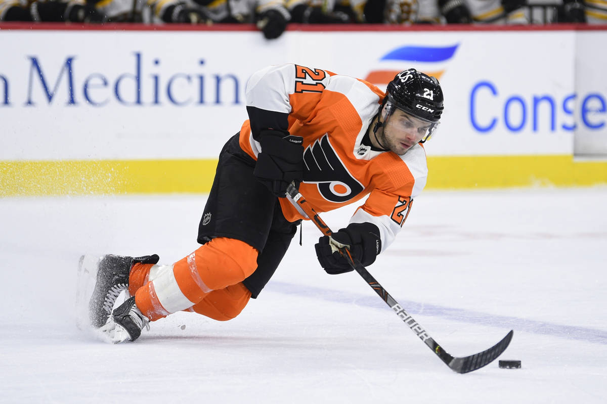 Philadelphia Flyers' Scott Laughton in action during an NHL hockey game against the Boston Brui ...