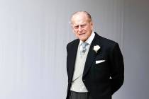 In this Friday, Oct. 12, 2018, file photo, Britain's Prince Philip waits for the bridal process ...