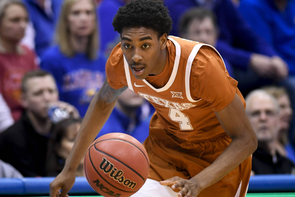 Texas Longhorns guard Donovan Williams (4) chases down a loose ball during the second half of a ...