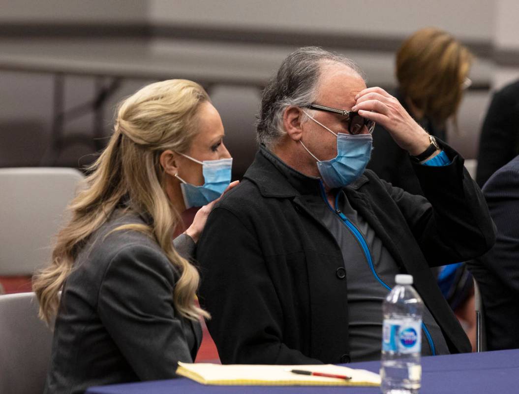 Attorney Christian Morris comforts Chantel Giacalone's father, Jack, on Friday, April, 9, 2021, ...