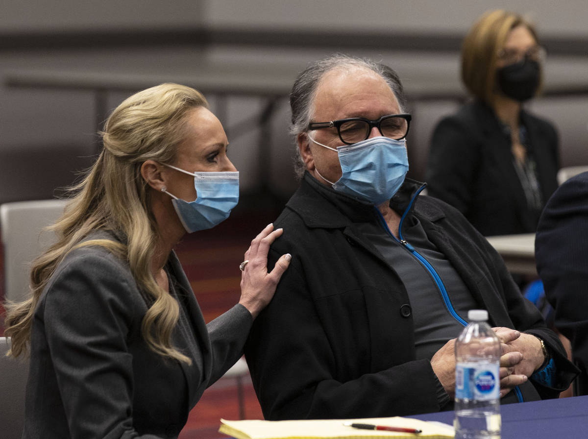 Attorney Christian Morris comforts Chantel Giacalone's father, Jack, on Friday, April, 9, 2021, ...