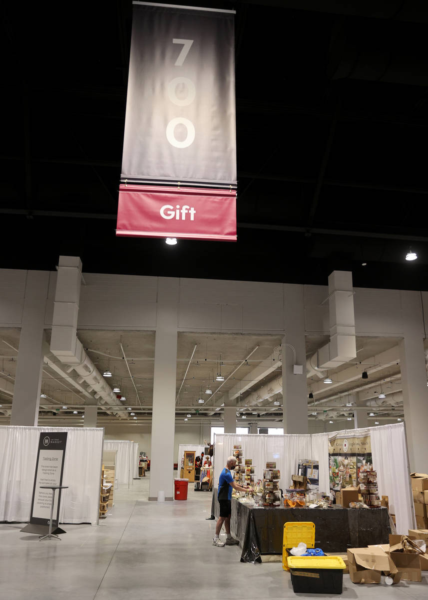 Gift and home temporary exhibitors set up for the Las Vegas Market after a ribbon-cutting cerem ...
