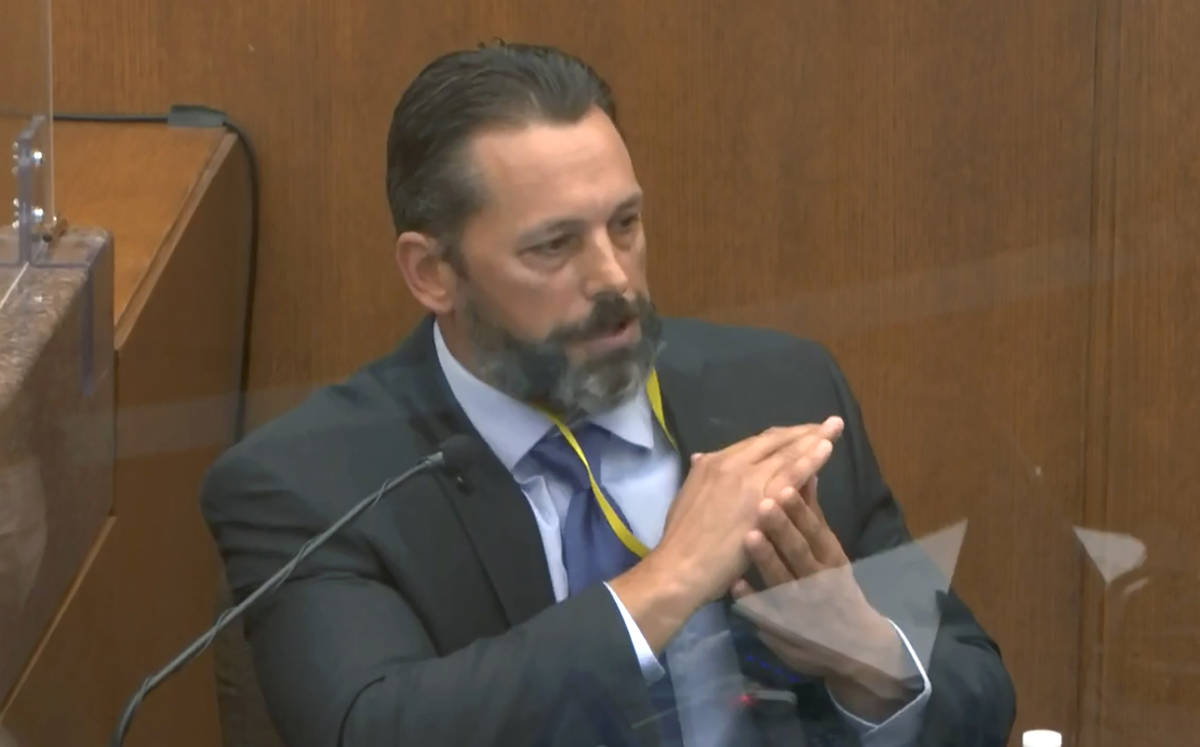In this image from video, Minneapolis Police Lt. Johnny Mercil, a use of force trainer, testifi ...