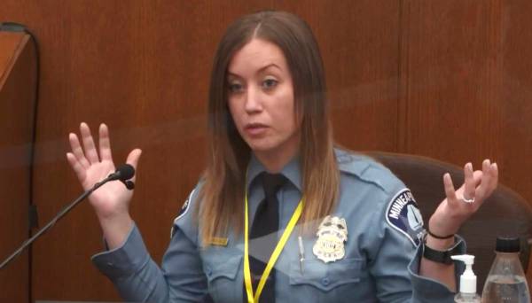 In this image from video, witness Minneapolis Police Officer Nicole Mackenzie testifies as Henn ...