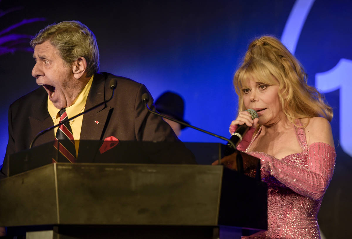 Casino Entertainment Legend Award winner Jerry Lewis, left, and Charo joke with the crowd at th ...