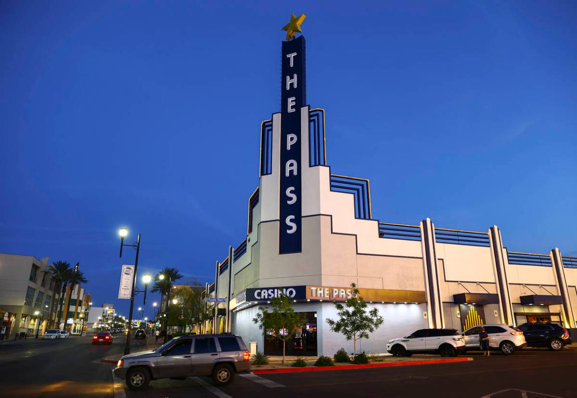 A car drives by The Pass casino in the Water Street District of downtown Henderson on Monday, A ...