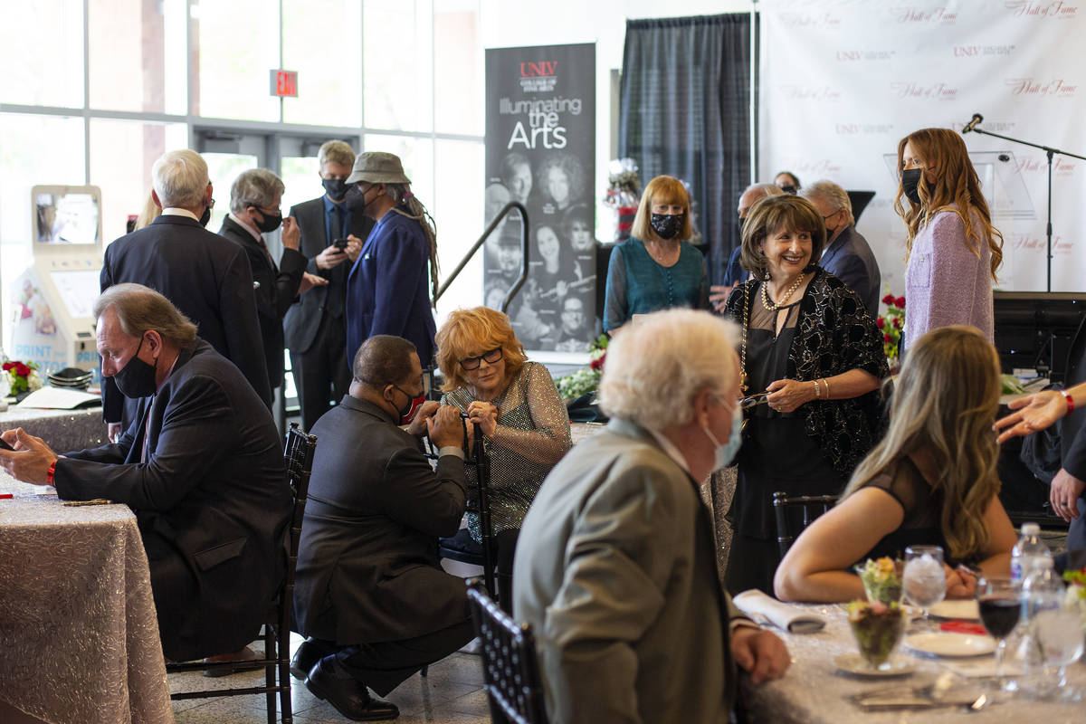 Attendees mingle before the 17th Annual College of Fine Arts Hall of Fame gala at the UNLV Stud ...