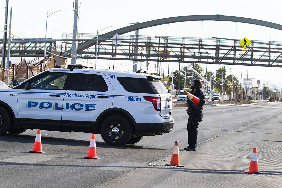 North Las Vegas police are investigating the death of a man found near a bus stop along Las Veg ...