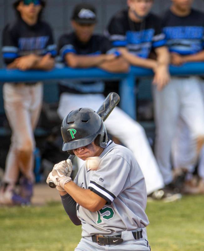 Palo Verde hitter Jason Schaaf (15) is brushed back by a pitch versus Basic during an NIAA base ...