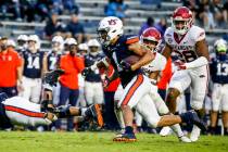 Auburn wide receiver Anthony Schwartz (1) carries the ball in for a touchdown against Arkansas ...
