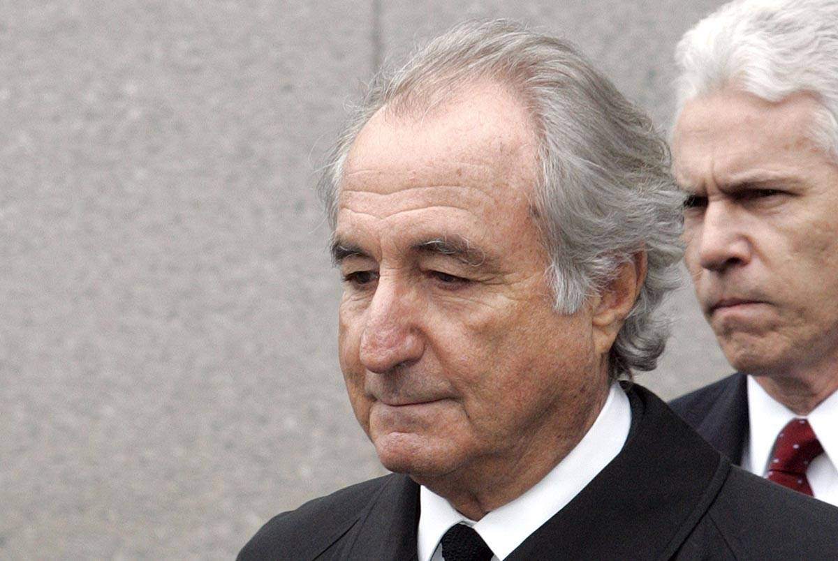 In this March 10, 2009, file photo, former financier Bernard Madoff exits Federal Court in New ...