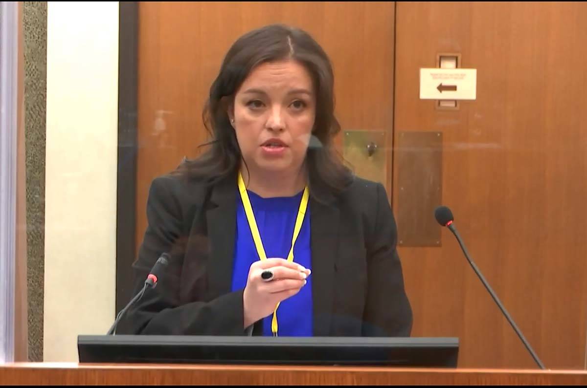 In this image from video, public defender, Adrienne Cousins representing Morries Hall ...