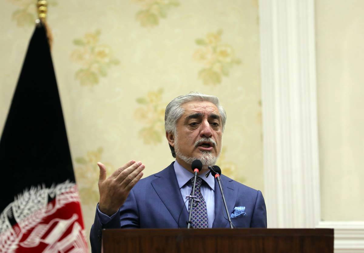 Abdullah Abdullah, Chairman of the High Council for National Reconciliation, speaks during a pr ...