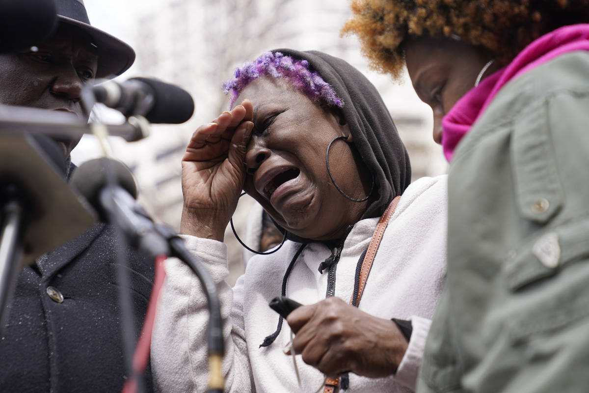 Angie Golson, grandmother of Daunte Wright, cries as she speaks during a news conference outsid ...