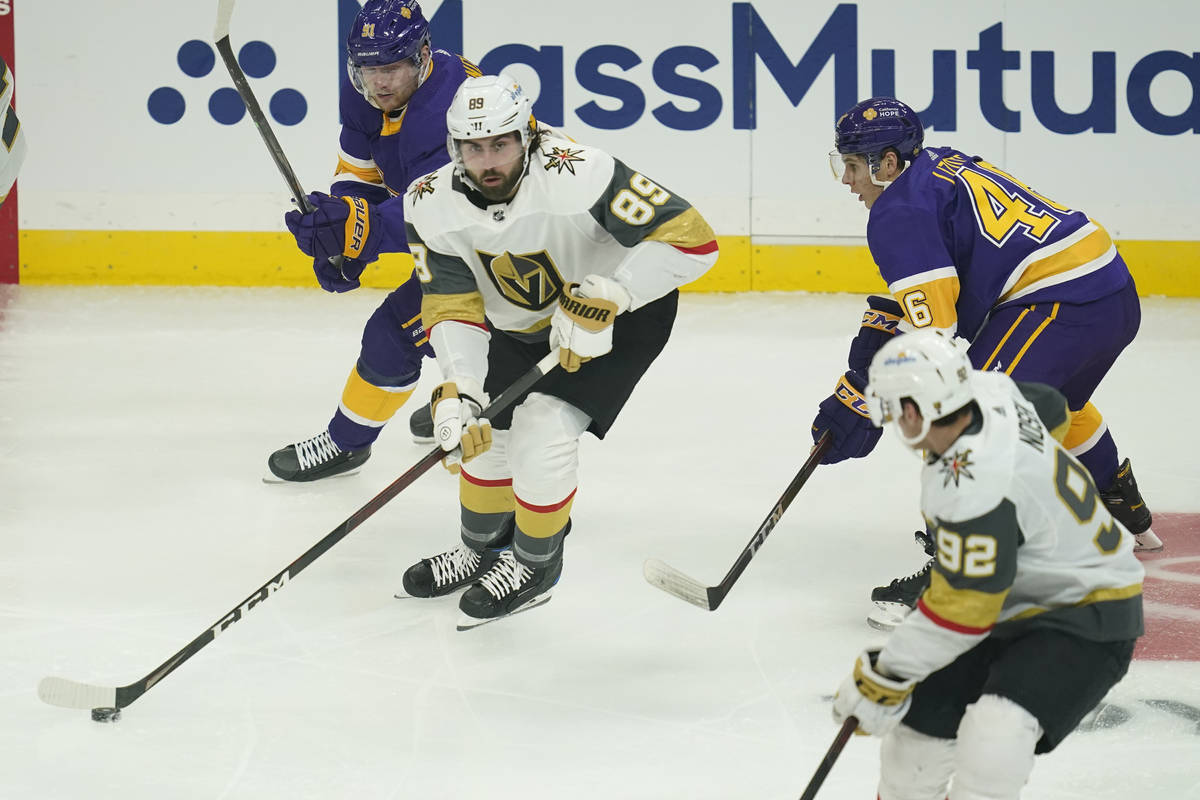 Vegas Golden Knights right wing Alex Tuch (89) takes control of the puck during the first perio ...