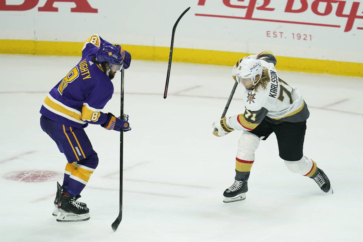Vegas Golden Knights center William Karlsson (71) breaks his stick while taking a shot against ...