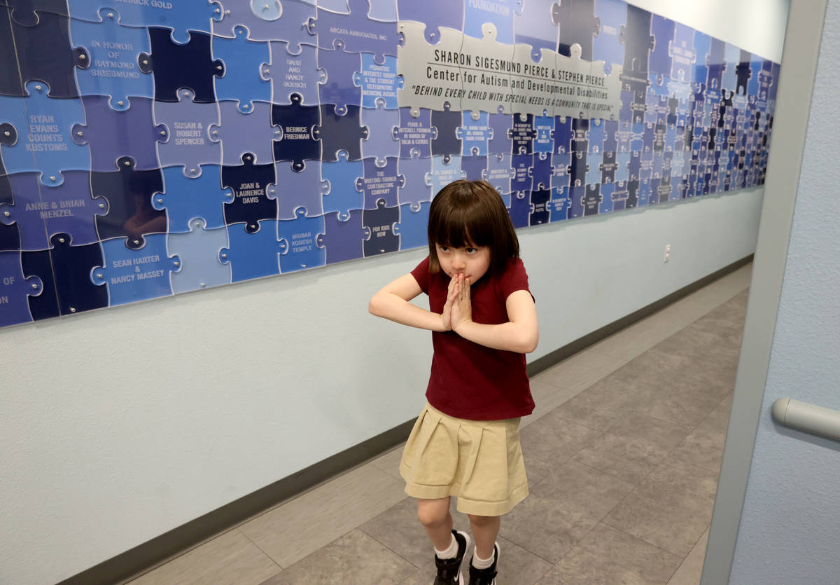 Akara Haase, 6, leaves after a session at the Center for Autism and Developmental Disabilities ...
