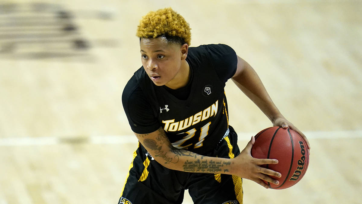 Towson guard Kionna Jeter works the floor against Maryland during the second half of an NCAA co ...