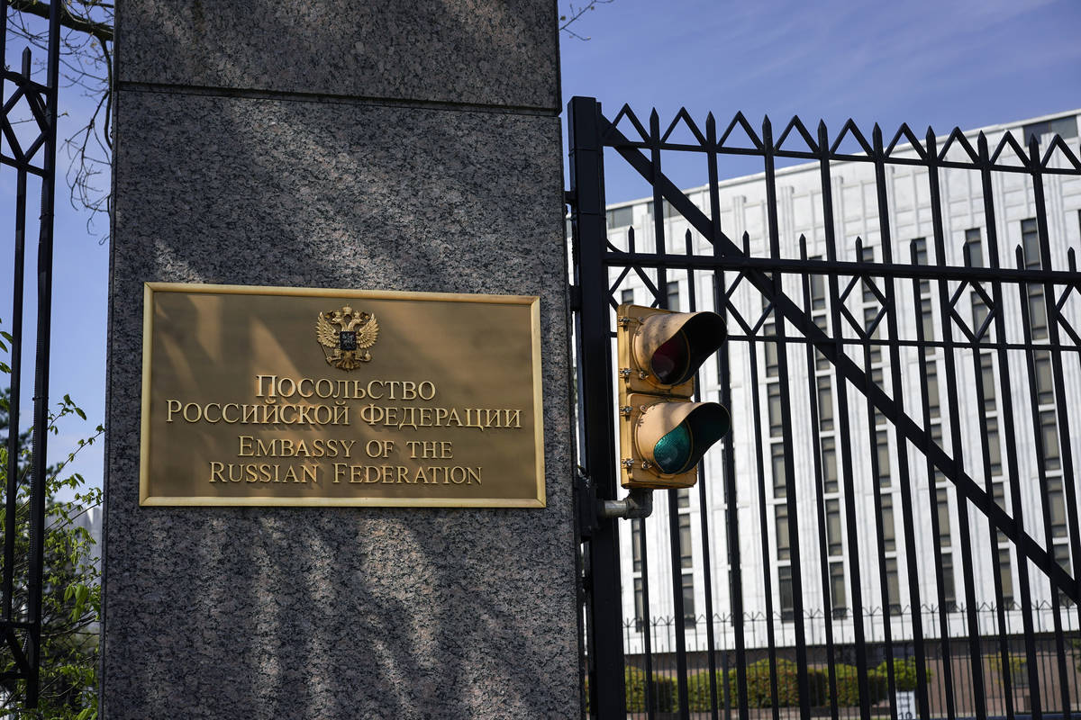 The entrance gate of the Embassy of the Russian Federation is seen in Washington, Thursday, Apr ...