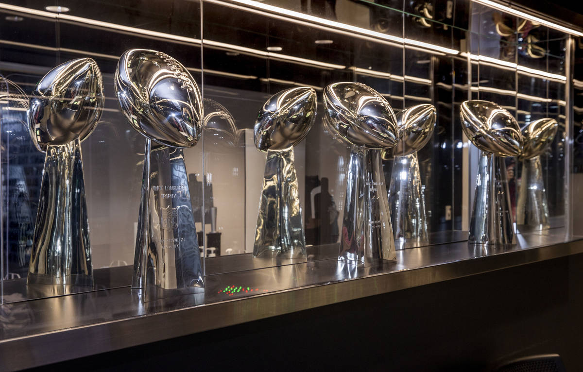 Three Lombardi Trophies signify their three World Championships of professional football victor ...