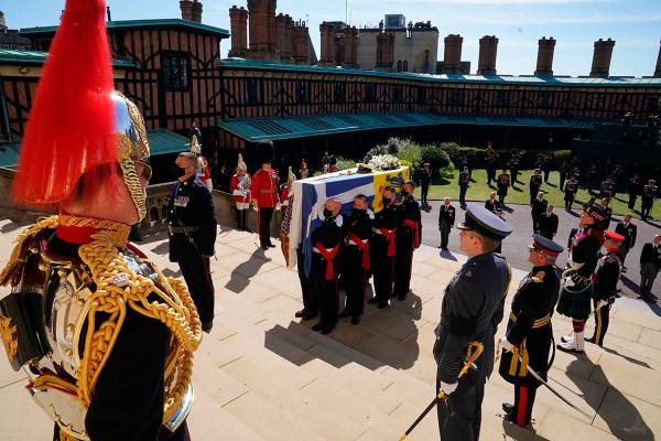 The coffin is held on the steps of St George's Chapel during the procession of Britain Prince P ...