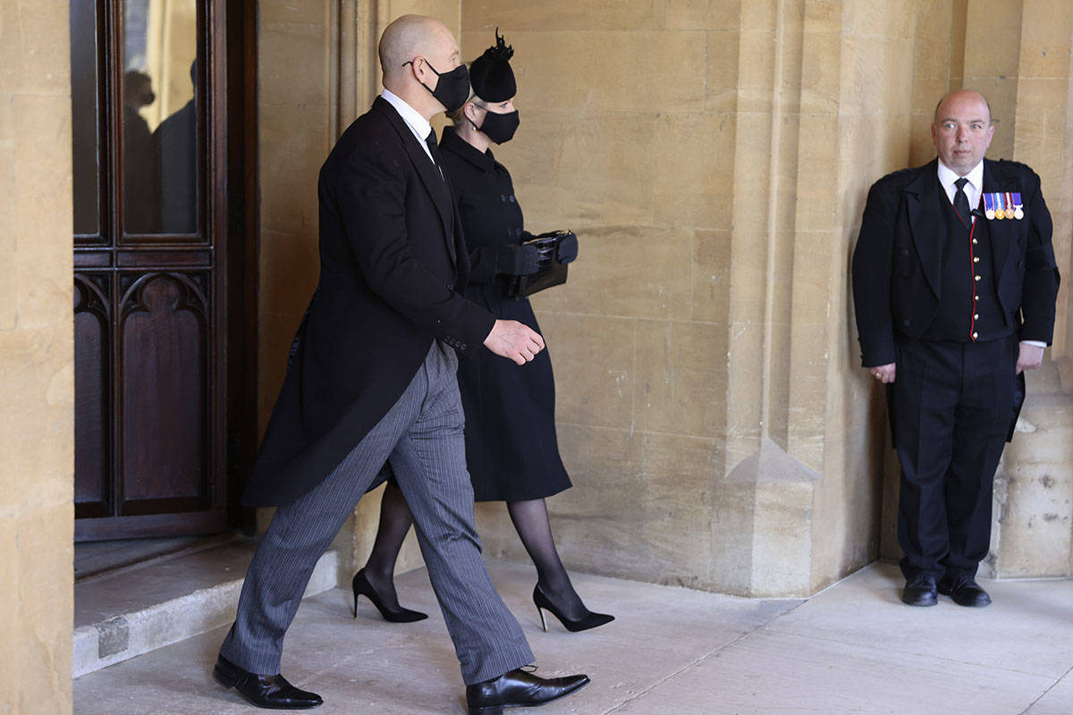 Zara Tindall, center, and Mike Tindall attend the funeral of Britain's Prince Philip inside Win ...