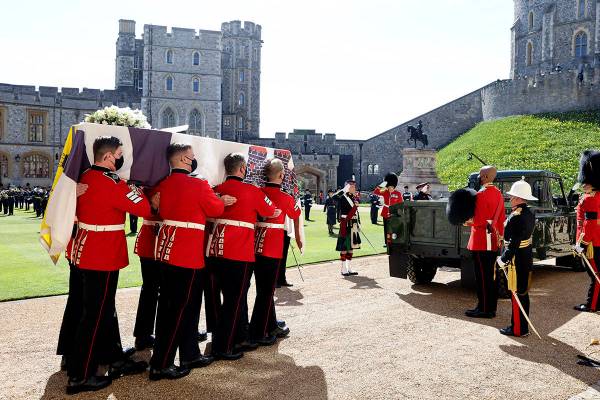 The Queen's Company, 1st Battalion Grenadier Guards carry the coffin of Prince Philip during th ...