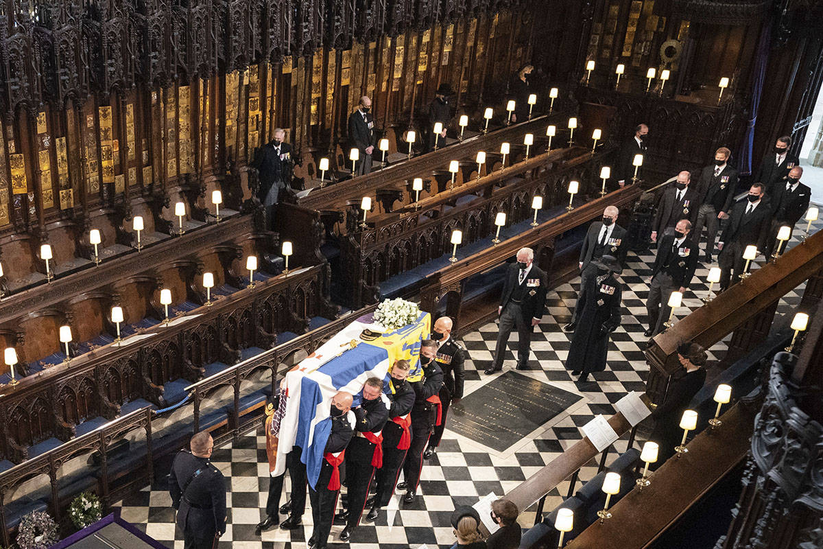 Pallbearers carry the coffin of the Duke of Edinburgh during his funeral, at St George's Chapel ...