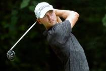 Adam Svensson hits his tee shot on the second hole during the third round of the Wyndham Champi ...