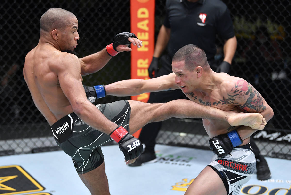 Tony Gravely and Anthony Birchak trade strikes in a bantamweight fight during the UFC Fight Nig ...