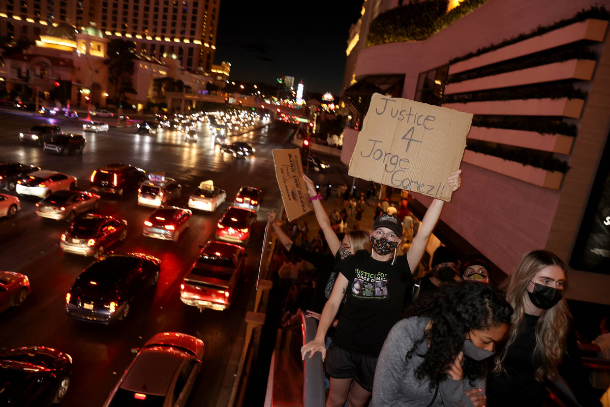 People protest on the Strip in Las Vegas Saturday, April 17, 2021, following the fatal police s ...