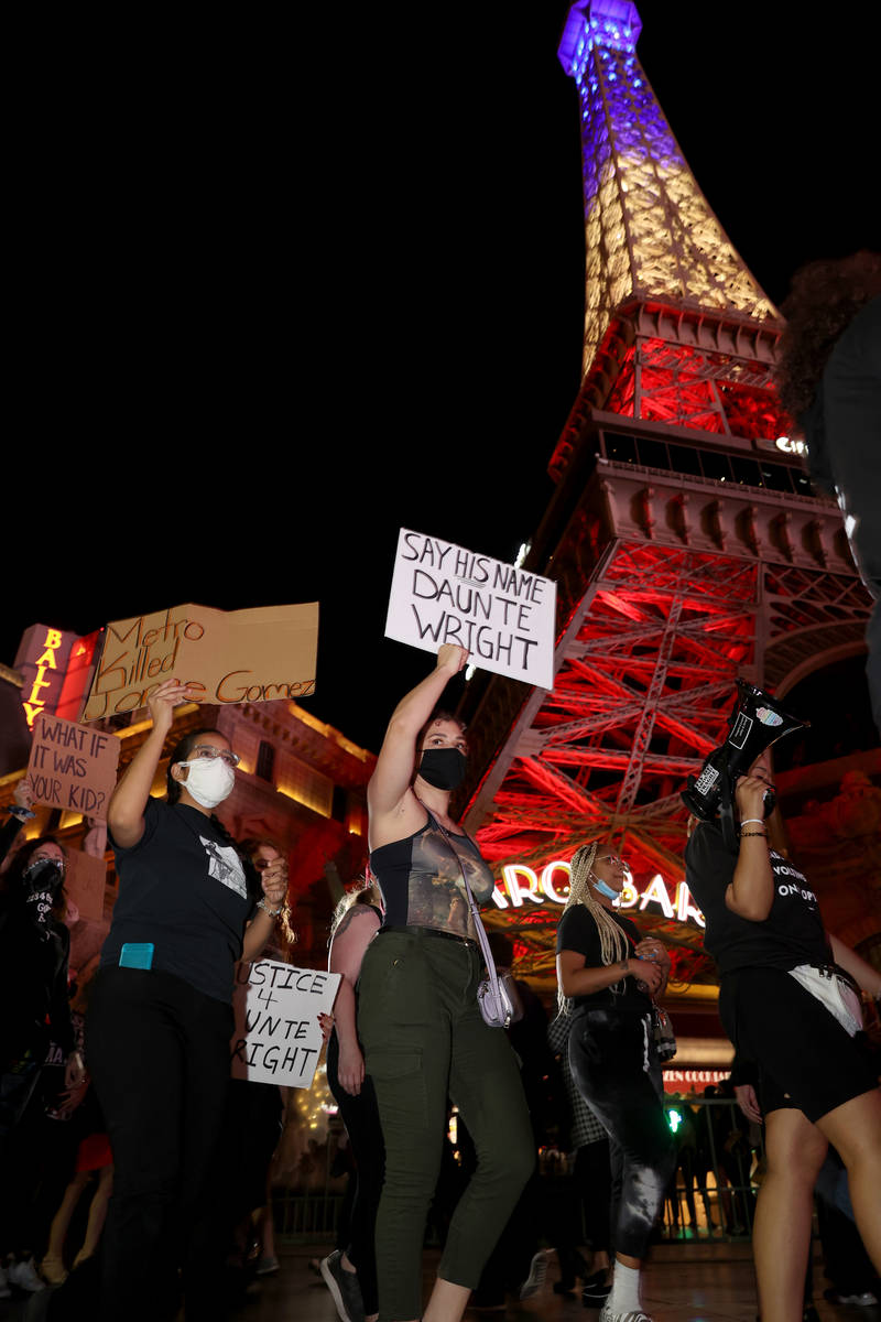 People protest on the Strip in Las Vegas Saturday, April 17, 2021, following the fatal police s ...