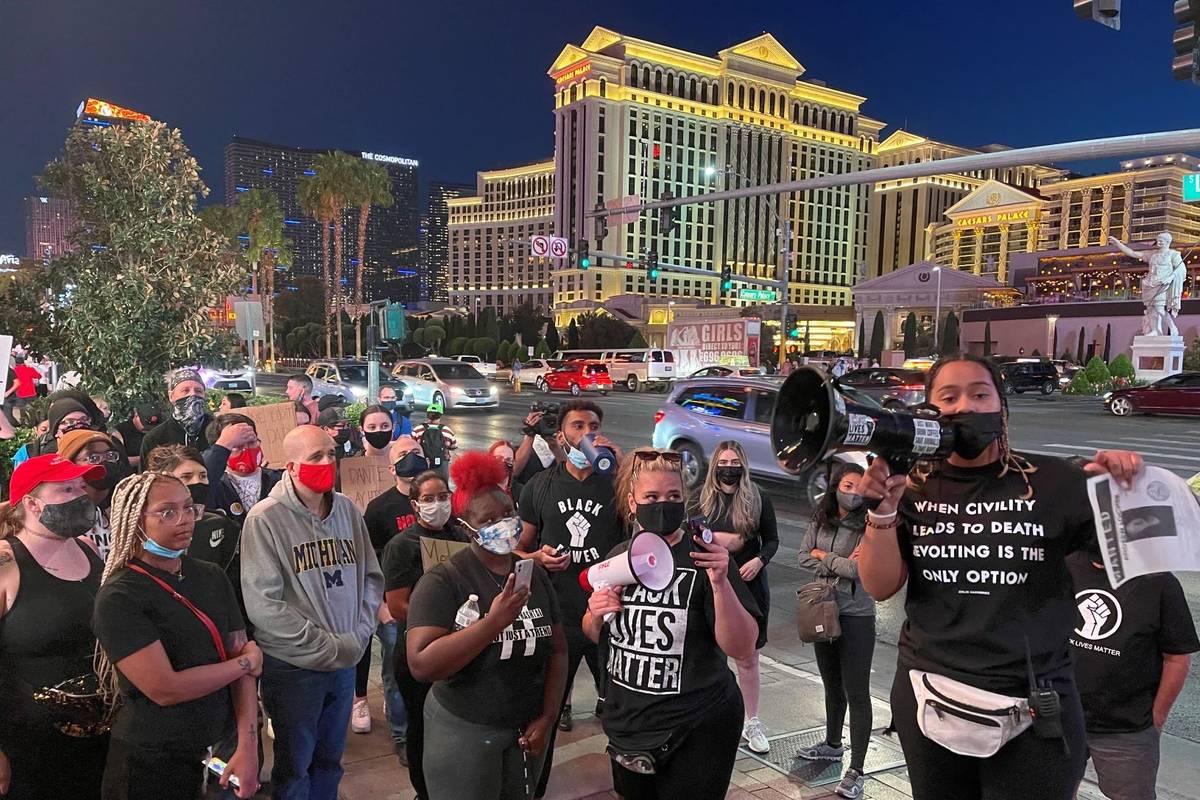 Desiree Smith of More Than A Hashtag speaks during a march on the Las Vegas Strip on Saturday, ...