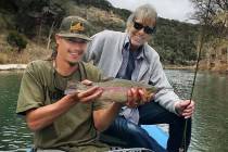 Bill Hughes, right, is pictured with his nephew Daniel Hughes during a fishing trip on the Guad ...