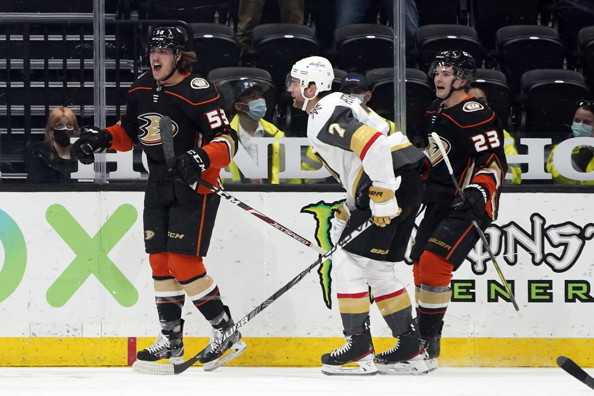 Anaheim Ducks left wing Max Comtois, left, celebrates after scoring during the first period of ...