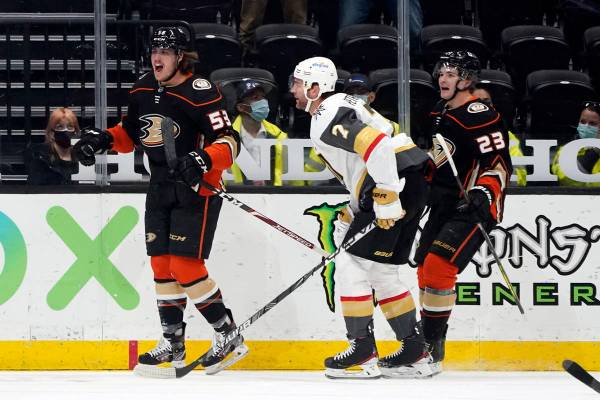 Anaheim Ducks left wing Max Comtois, left, celebrates after scoring during the first period of ...