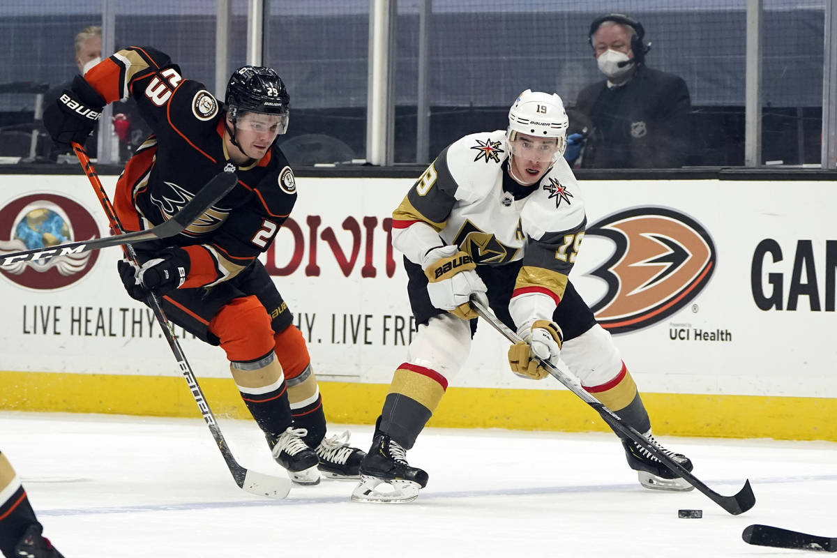 Vegas Golden Knights right wing Reilly Smith (19) controls the puck in front of Anaheim Ducks c ...