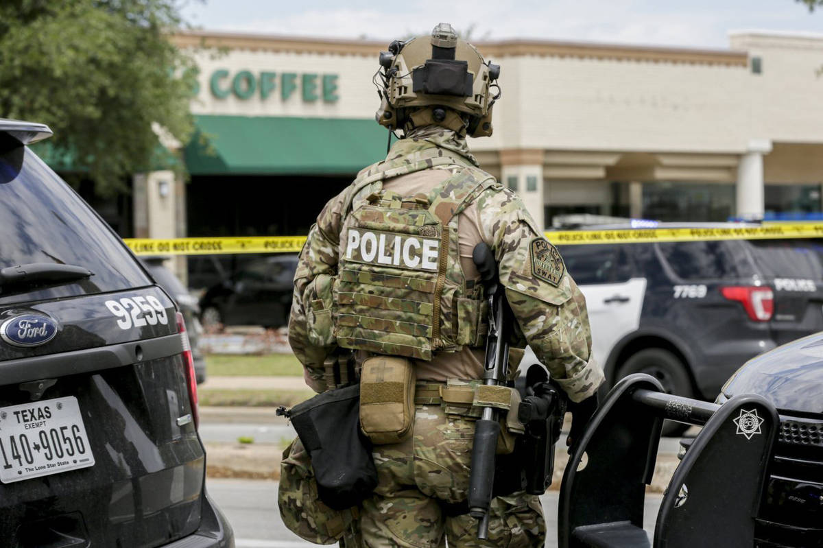 Austin police, SWAT and medical personnel respond to an active shooter situation located Great ...