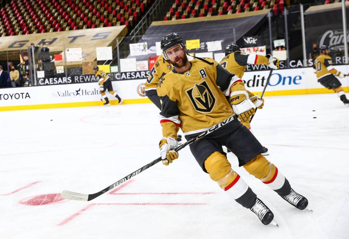 Golden Knights defenseman Alex Pietrangelo warms up before an NHL hockey game at T-Mobile Arena ...