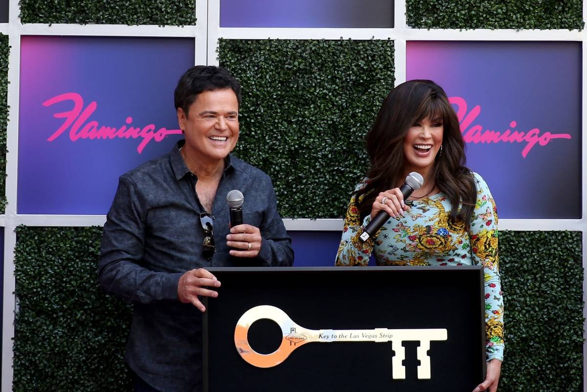 Strip headliners Donny and Marie Osmond receive a Key to The Las Vegas Strip during a ceremony ...