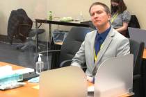 In this image from video, former Minneapolis police Officer Derek Chauvin listens as his defens ...