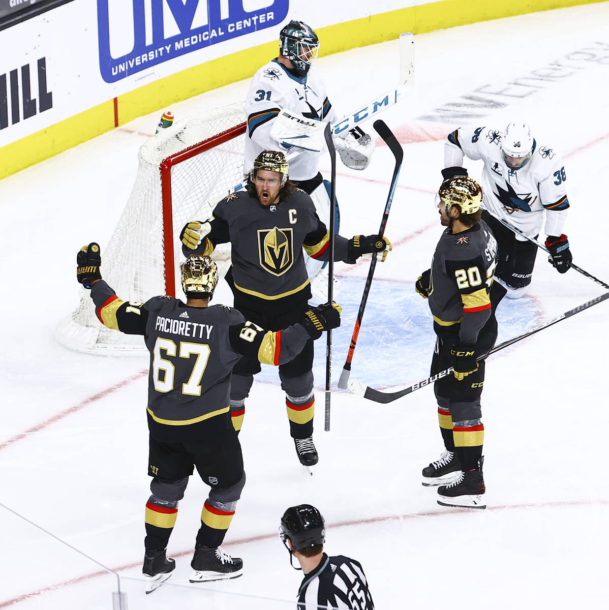 Golden Knights' Mark Stone (61) celebrates with teammates after scoring against San Jose Sharks ...
