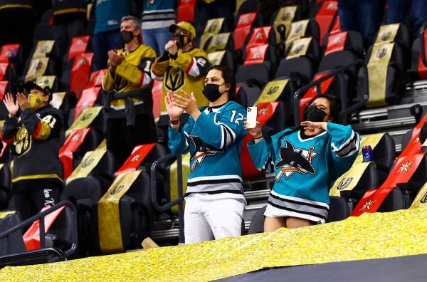 Hockey fans celebrate as San Jose Sharks' Patrick Marleau, not pictured, is honored in the 1,76 ...